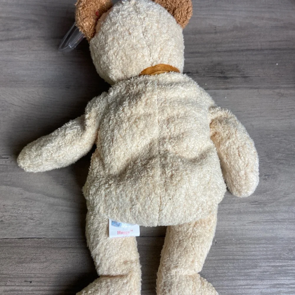 Ty Beanie Baby named Huggy the Bear, released in 2000,‎ NWT